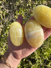 Load image into Gallery viewer, Yellow Calcite Palm Stone
